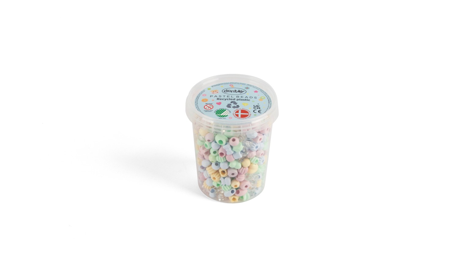 Gennemsigtig plastikbeholder med små farvede perler i pastelfarver.